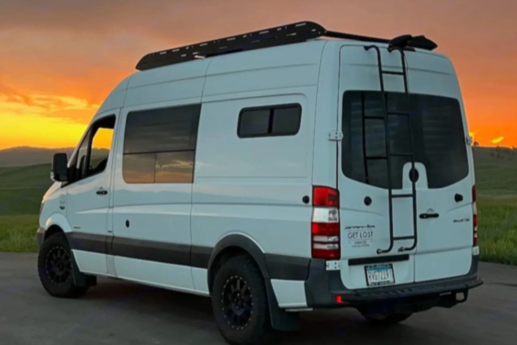 Sprinter camper van rental in the Twin Cities parked at sunset, ideal for road trips starting in Minneapolis and St. Paul.