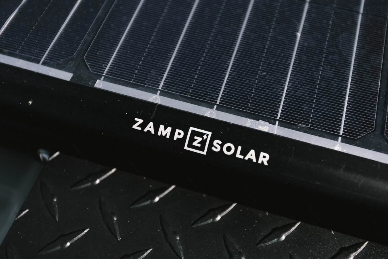 Zamp solar panel powering off-grid luxury Mercedes Sprinter camper van.