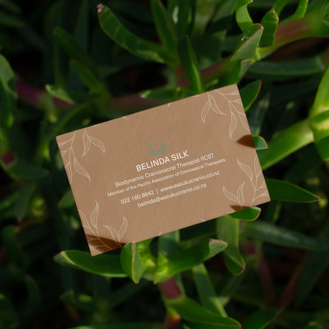 Minimal typography, soft neutral tones and generous white space evoke calmness before a word is even read. The type hierarchy guides the eye gently rather than demanding attention. 

The textured paper stock adds warmth and depth, inviting touch the 