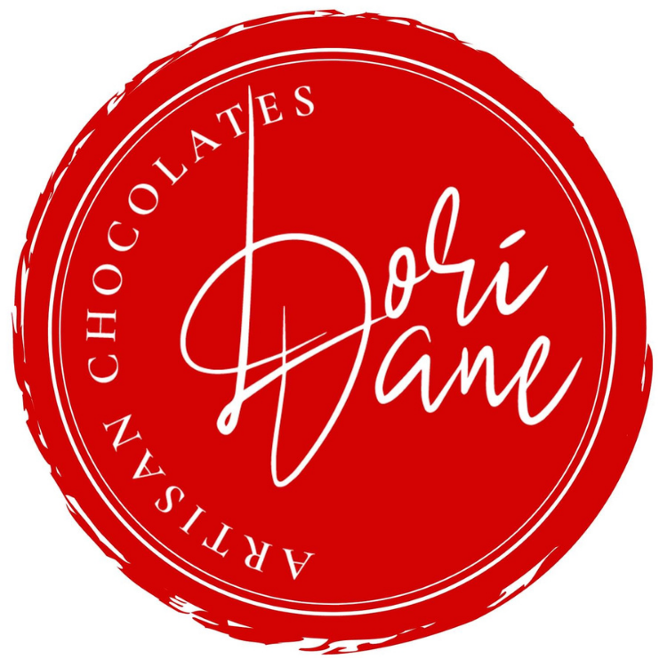 Red circular logo with white script and text reading 'Dori Dane Artisan Chocolates.'