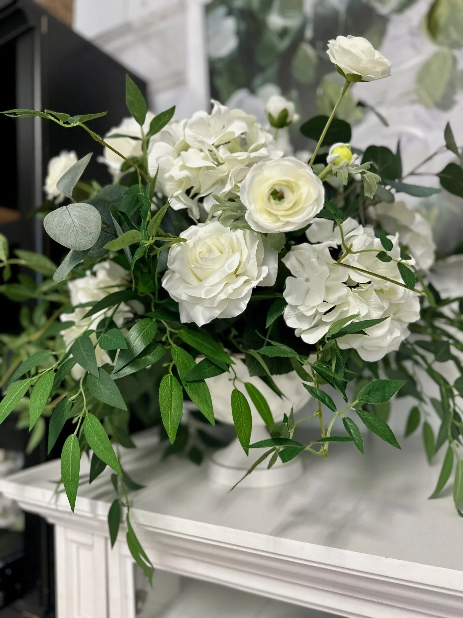 White and Green Large Faux Floral in White Urn.jpeg