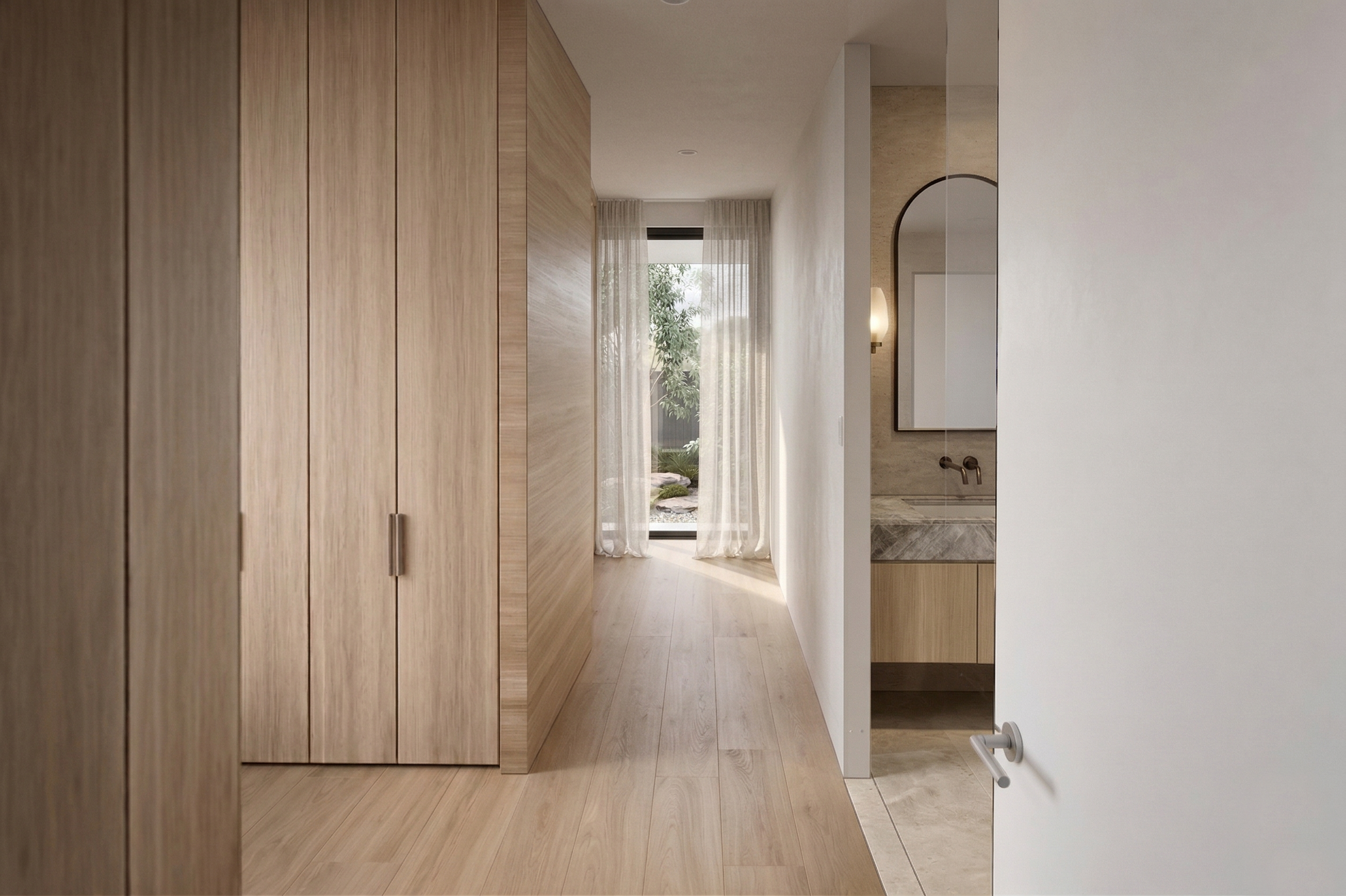 A modern, minimalist hallway with wooden cabinetry on the left and a bathroom area with a mirror and sink on the right, with sheer curtains at the end revealing a garden view.