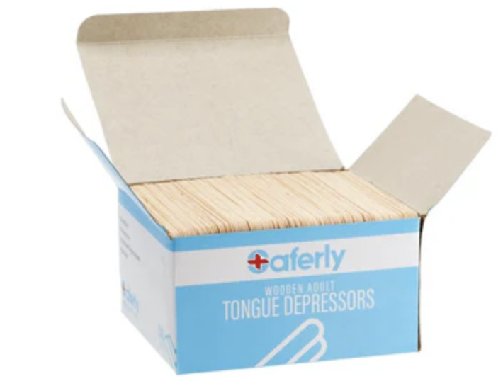 Open box of wooden adult tongue depressors with the packaging labeled 'Saferly' and 'Tongue Depressors'.