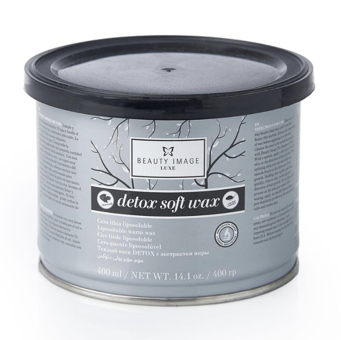 A container of Beauty Image Luxe detox soft wax, 400 ml (14.1 oz), with a black lid and gray label featuring a tree branch design.