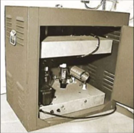 The back side of the "Scoon" device, showing two levels of electronics. The top level is unfortunately in the shadow of the top of the case.