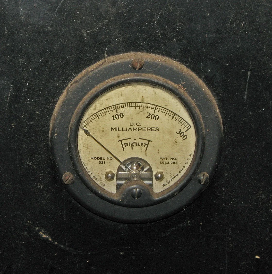 "Low" device closeup of Triplett milliampmeter, 0-300 volts D.C.