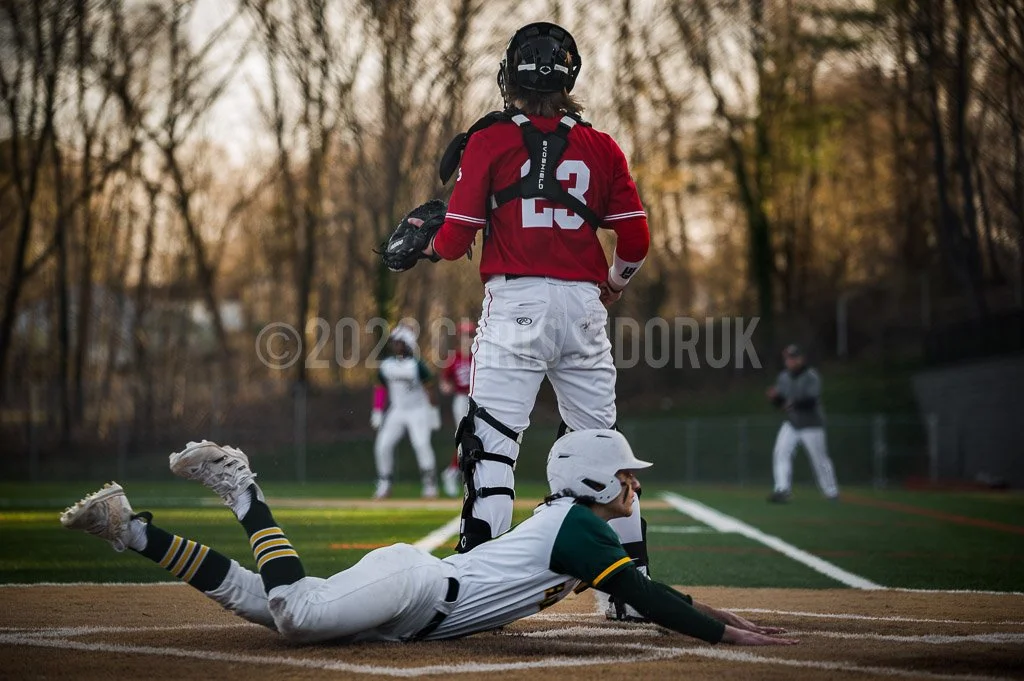 Aiden Jovia (#10) sliding into home during Hamden’s rally in the bottom of the sixth.