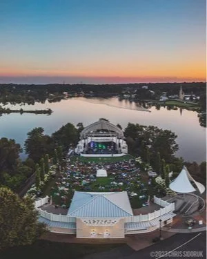 Aerial view of Levitt Pavilion in Westport, CT, showcasing the outdoor stage and scenic surroundings by the Saugatuck River. | photo- ©2023 Chris Sidoruk