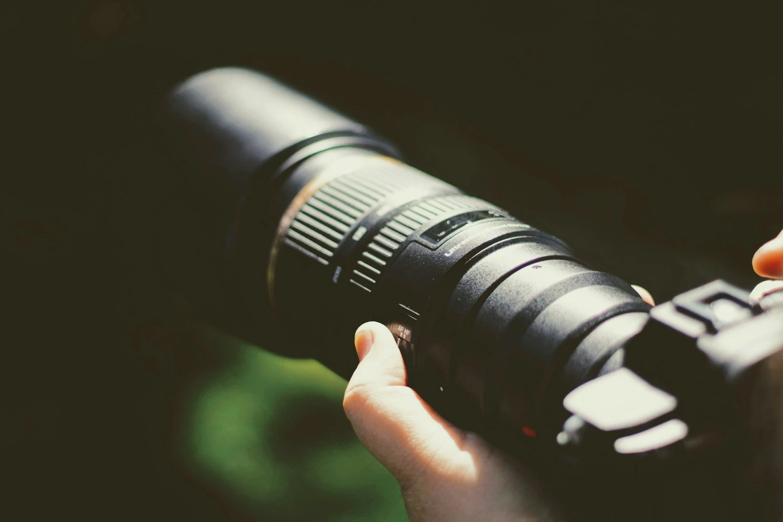Stock image of a camera being held.