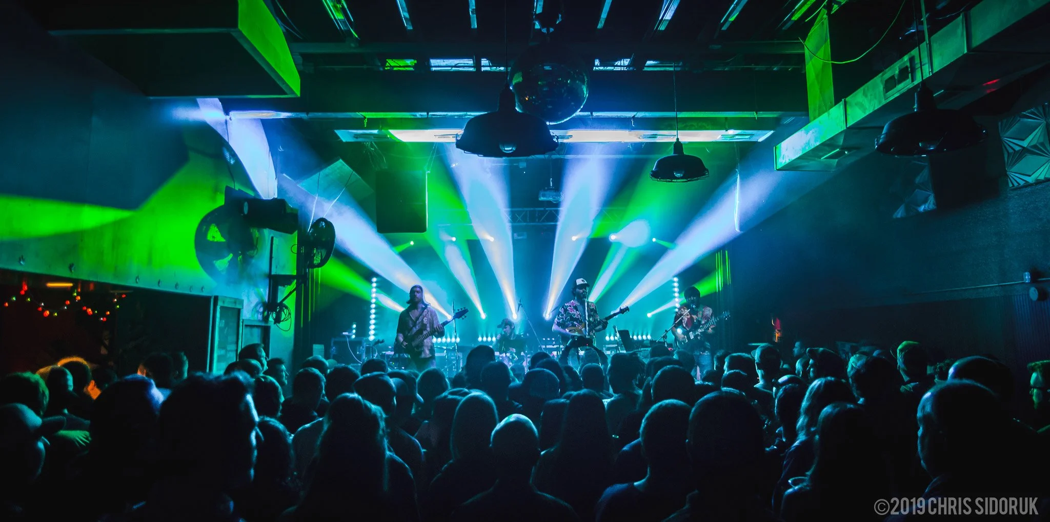 Goose performing live at The Acoustic in Bridgeport, Connecticut, on April 20, 2019, with stage and audience visible.