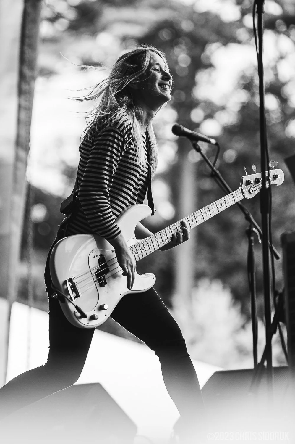 concert photography shallow depth of field subject isolation