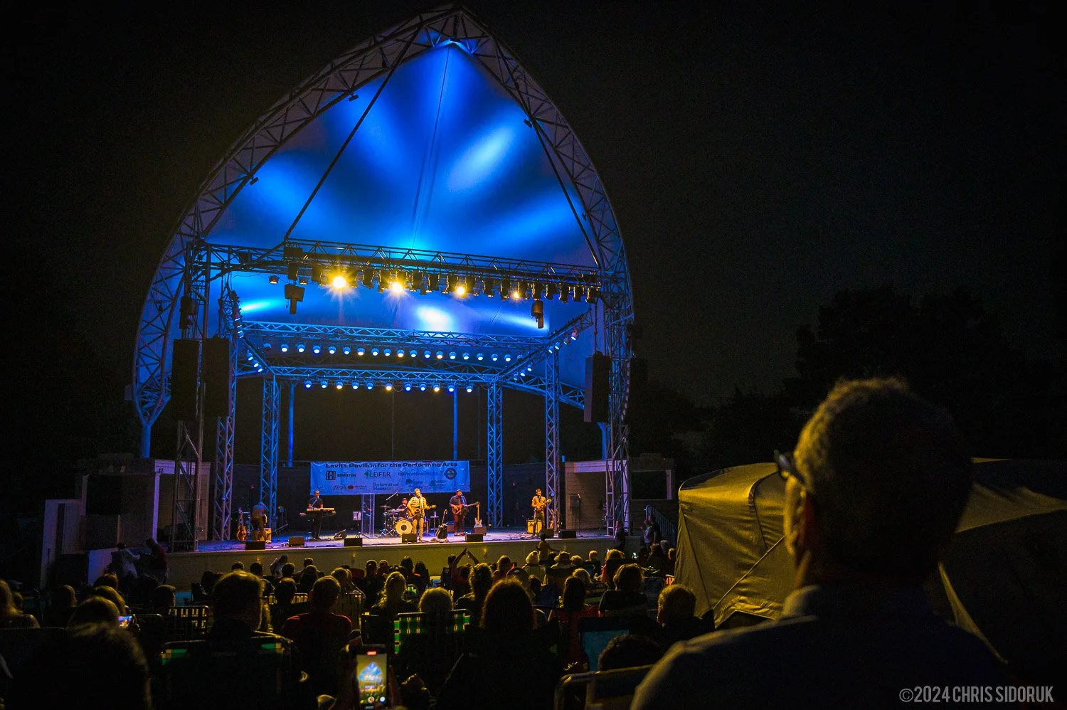 concert stage lighting at night during a live outdoor show at Levitt Pavilion in Westport Connecticut