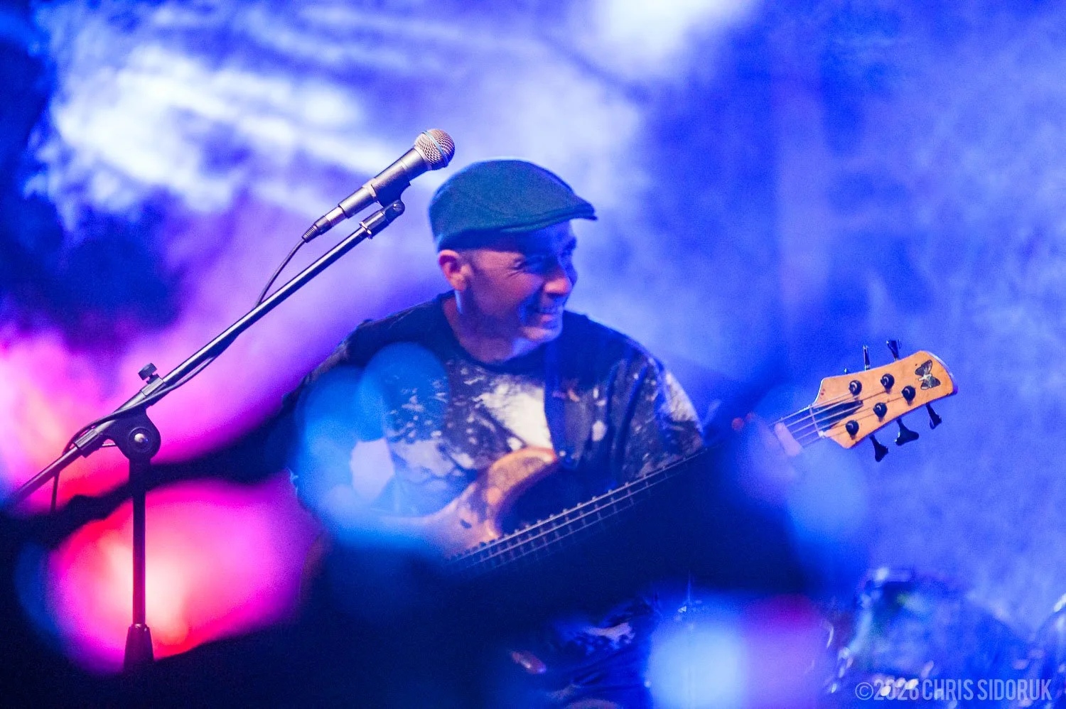 concert photography framing through stage elements