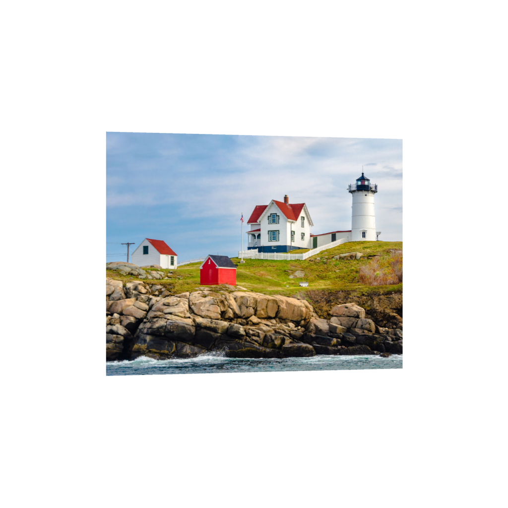 Fine art print of a coastal lighthouse and keeper’s house on a rocky shoreline