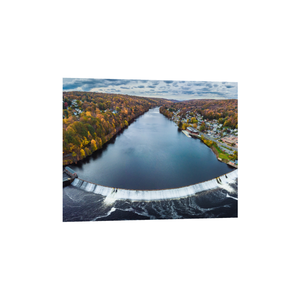 Fine art print of an aerial river and dam surrounded by colorful fall foliage in New England