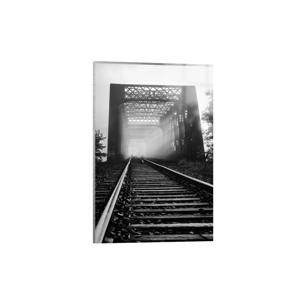 Black and white train trestle bridge photograph printed on metal with a sleek, modern finish