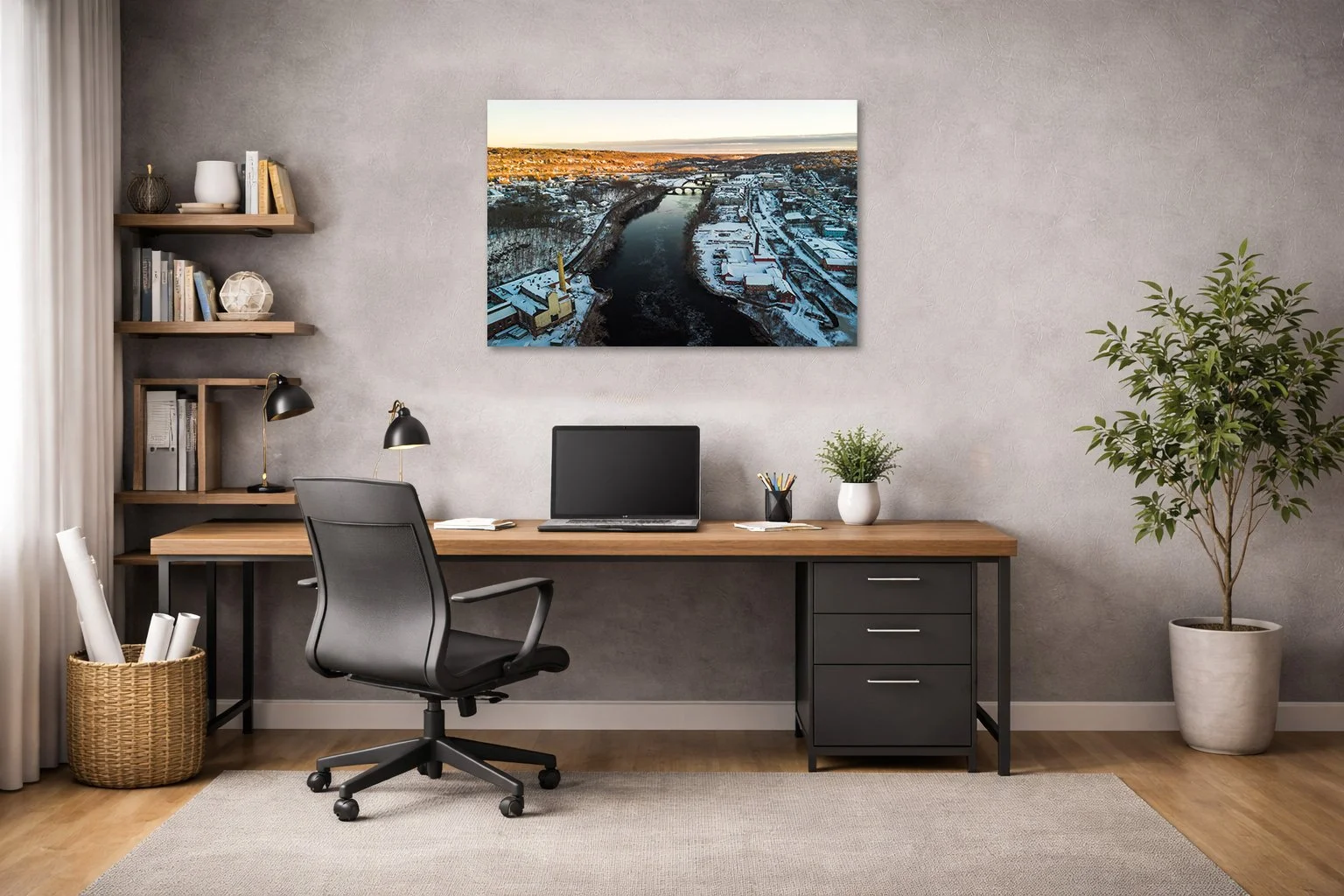 Aerial winter river town photograph displayed in a modern interior space