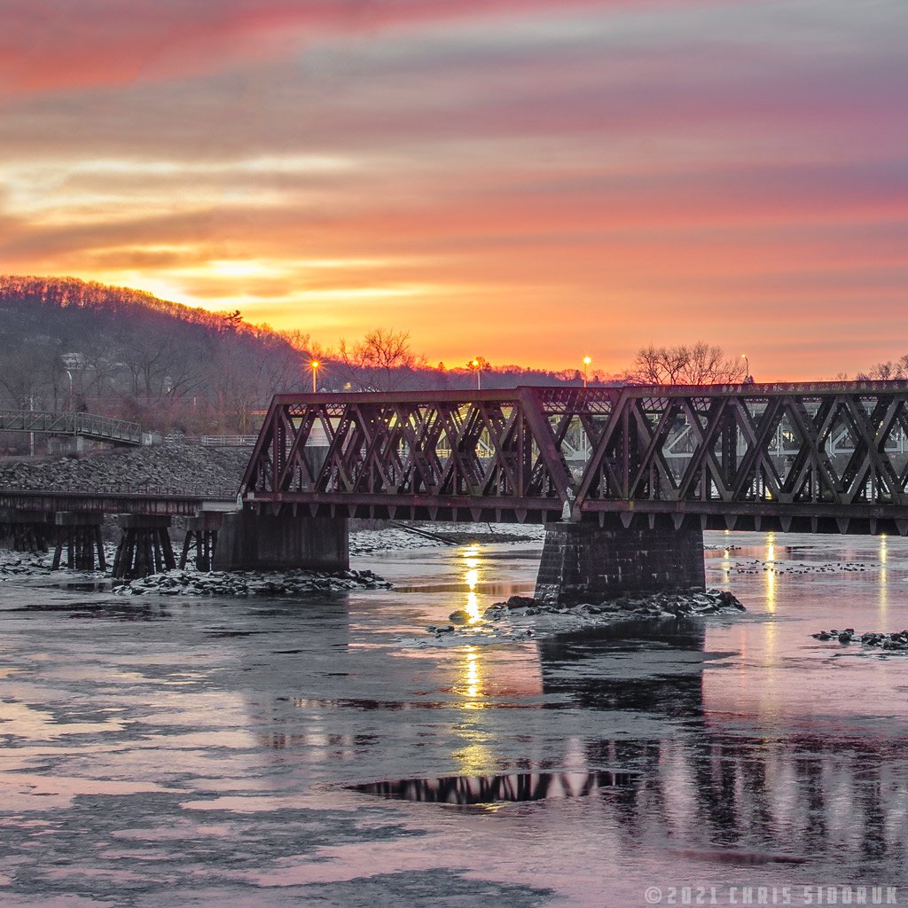 Sunrise in Shelton, CT, over the partially frozen Housatonic River.