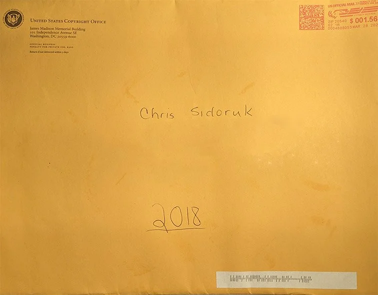 Mailed certificate; group registration of photos from 2018.