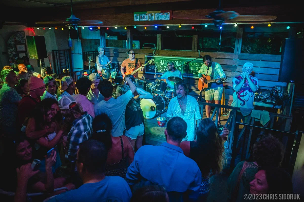 Nightlife scene in St John USVI with live band performing to a crowded indoor audience