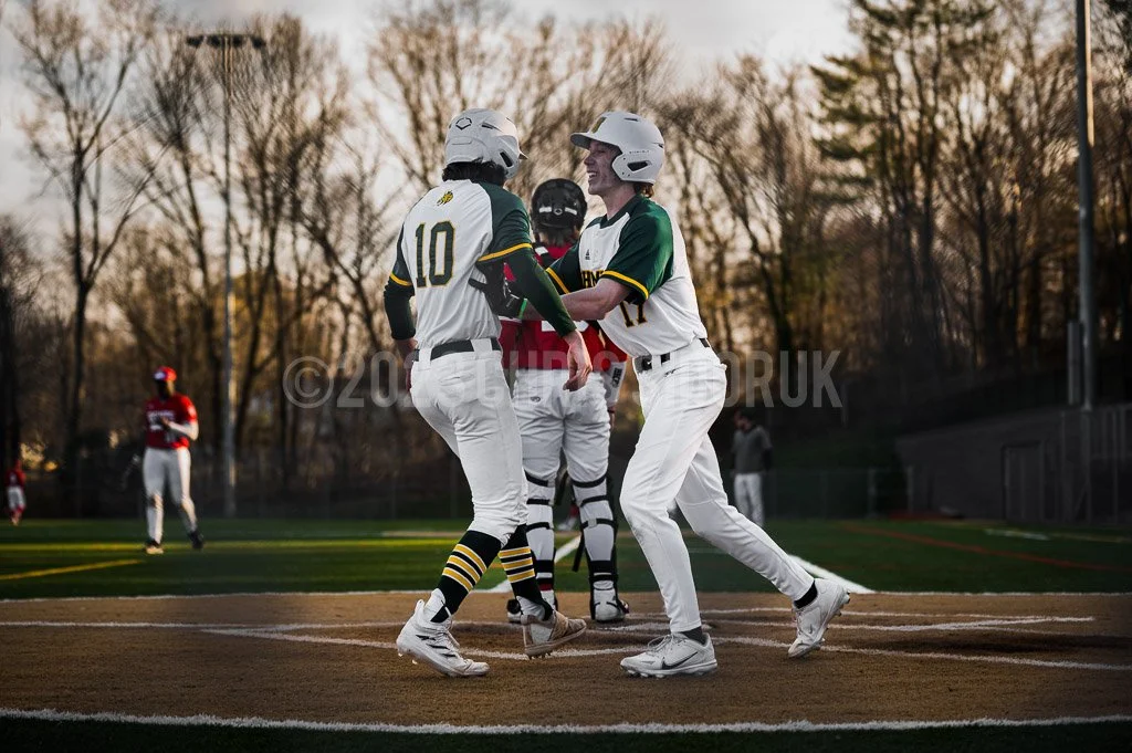 Aiden Jovia (#10) and Will Benedetti (#17) celebrating Hamden’s go ahead runs in the bottom of the sixth.