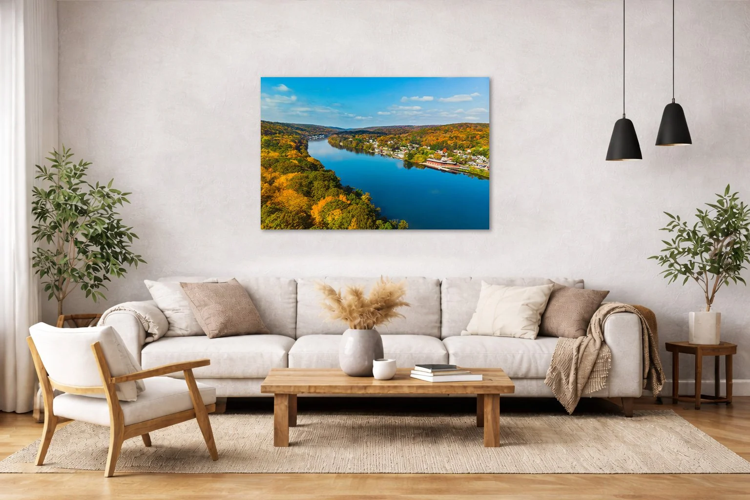 Aerial autumn river landscape photograph displayed in a bright, modern interior space