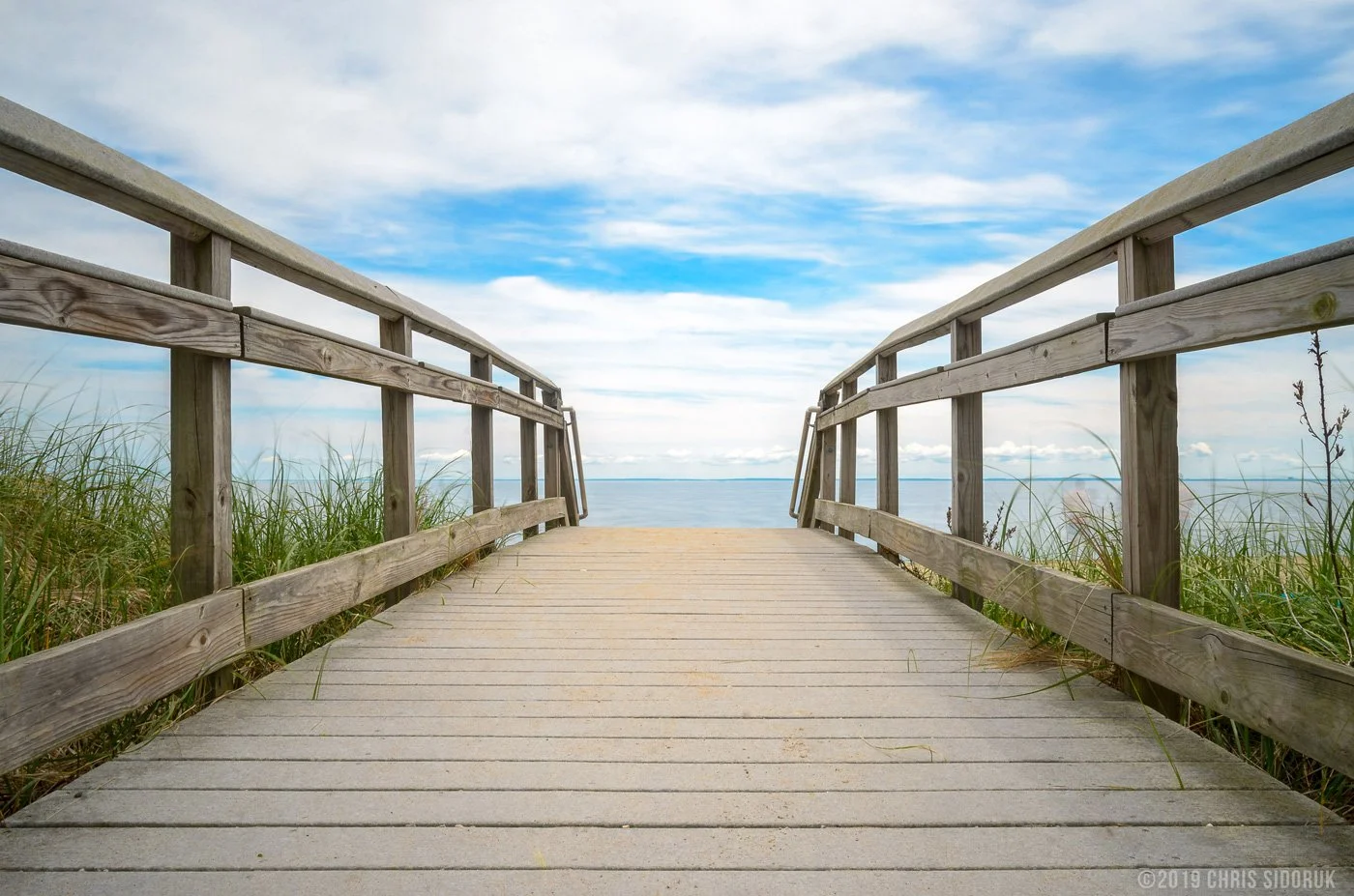Boardwalk leading from Silver Sands State Park to Walnut Beach in Milford, Connecticut.