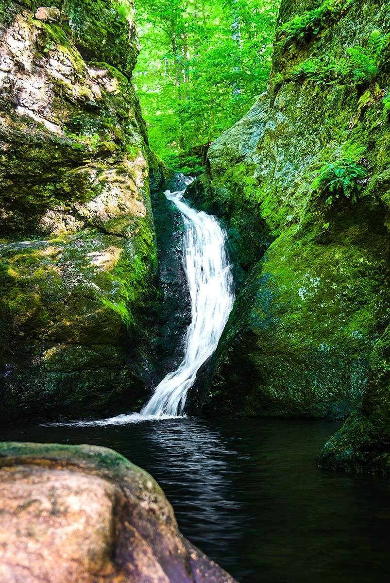 Waterfall at Indian Well State Park, a serene natural oasis in Connecticut.