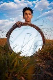 child with mirror