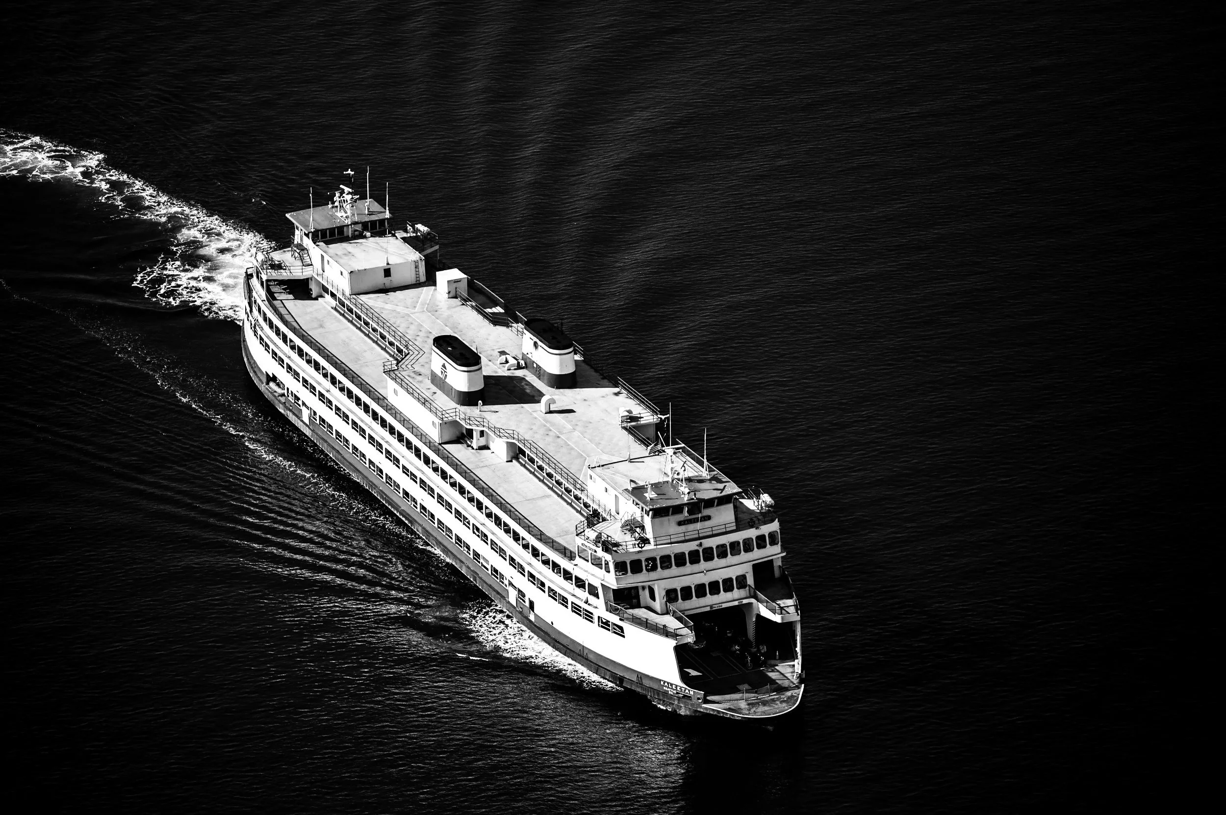 Image of a large ferry sailing at sea.