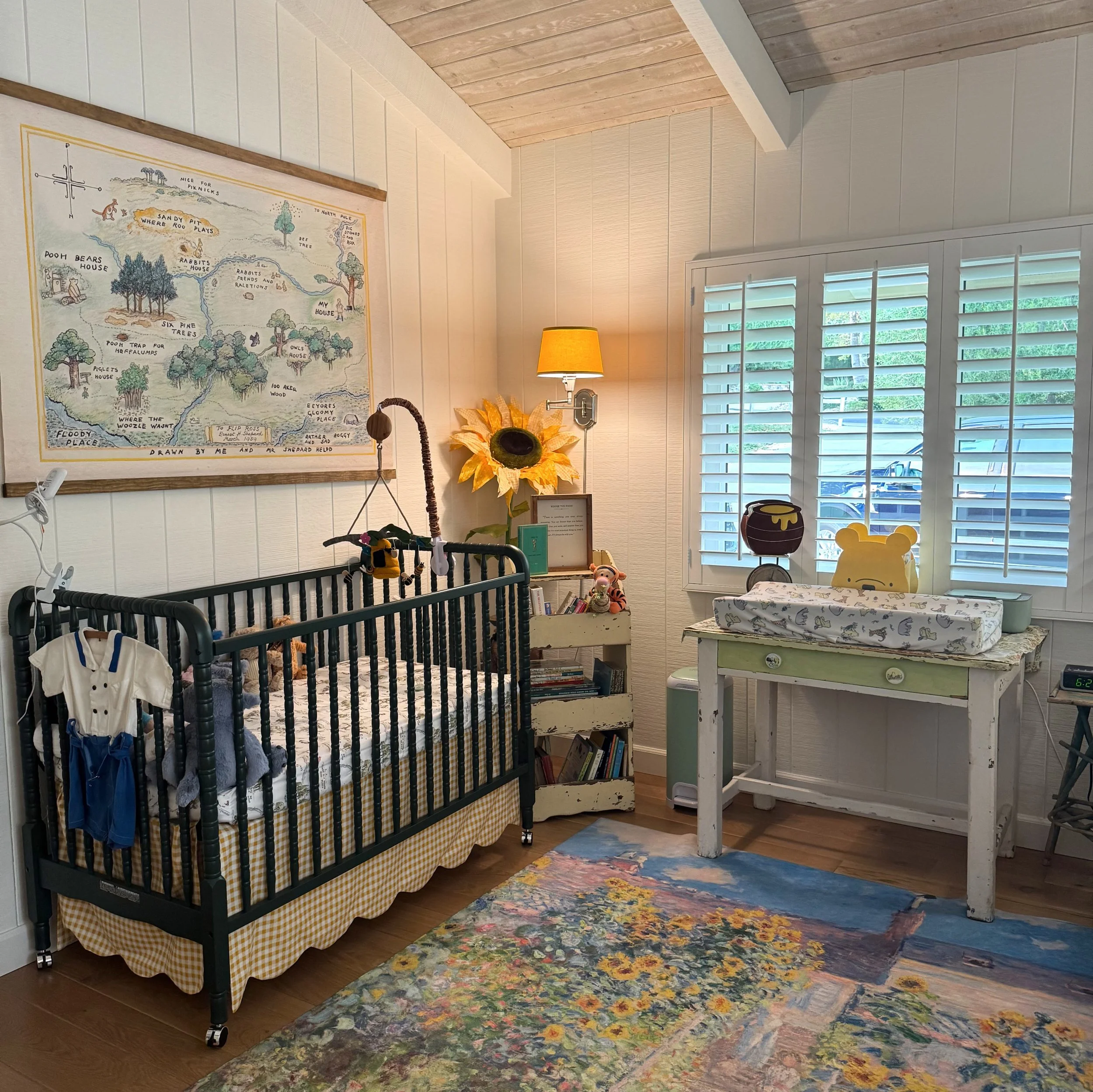 midweek inspiration 🌼 a little peek inside my grandson&rsquo;s nursery. 

our take on the Hundred Acre Wood, filled with vintage finds, old books, chippy furniture, gingham, and a whole lot of whimsy 🍯🥹

one of our favorite things about decorating
