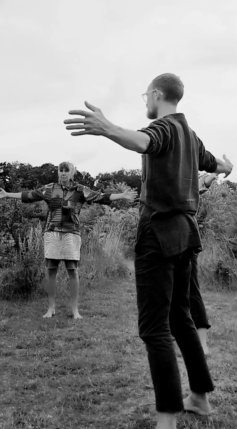 Basti leading a class on the grass