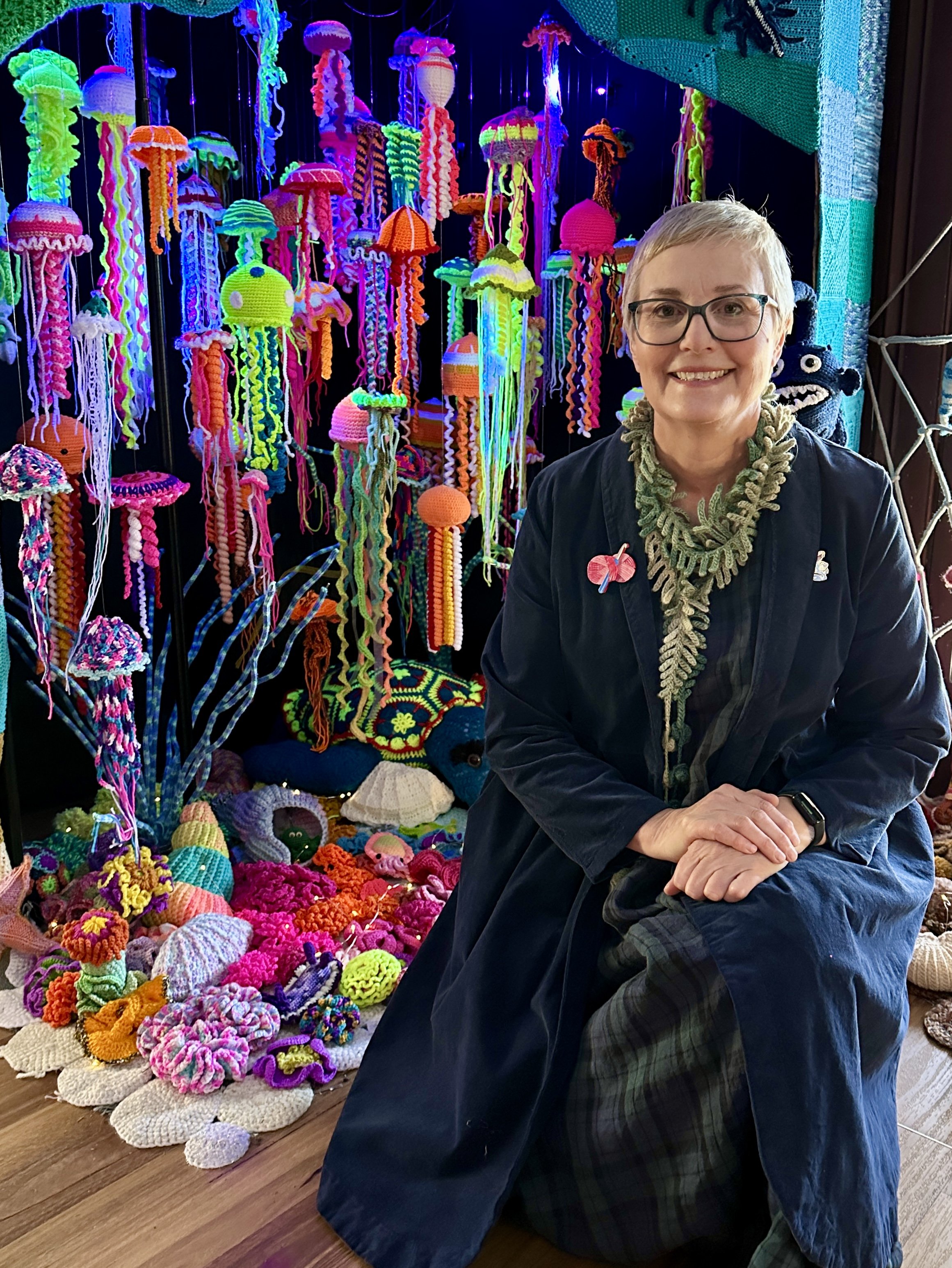 Loretta Grayson with Submerged by the Yarntopians, 2026
Photo: Loretta Grayson