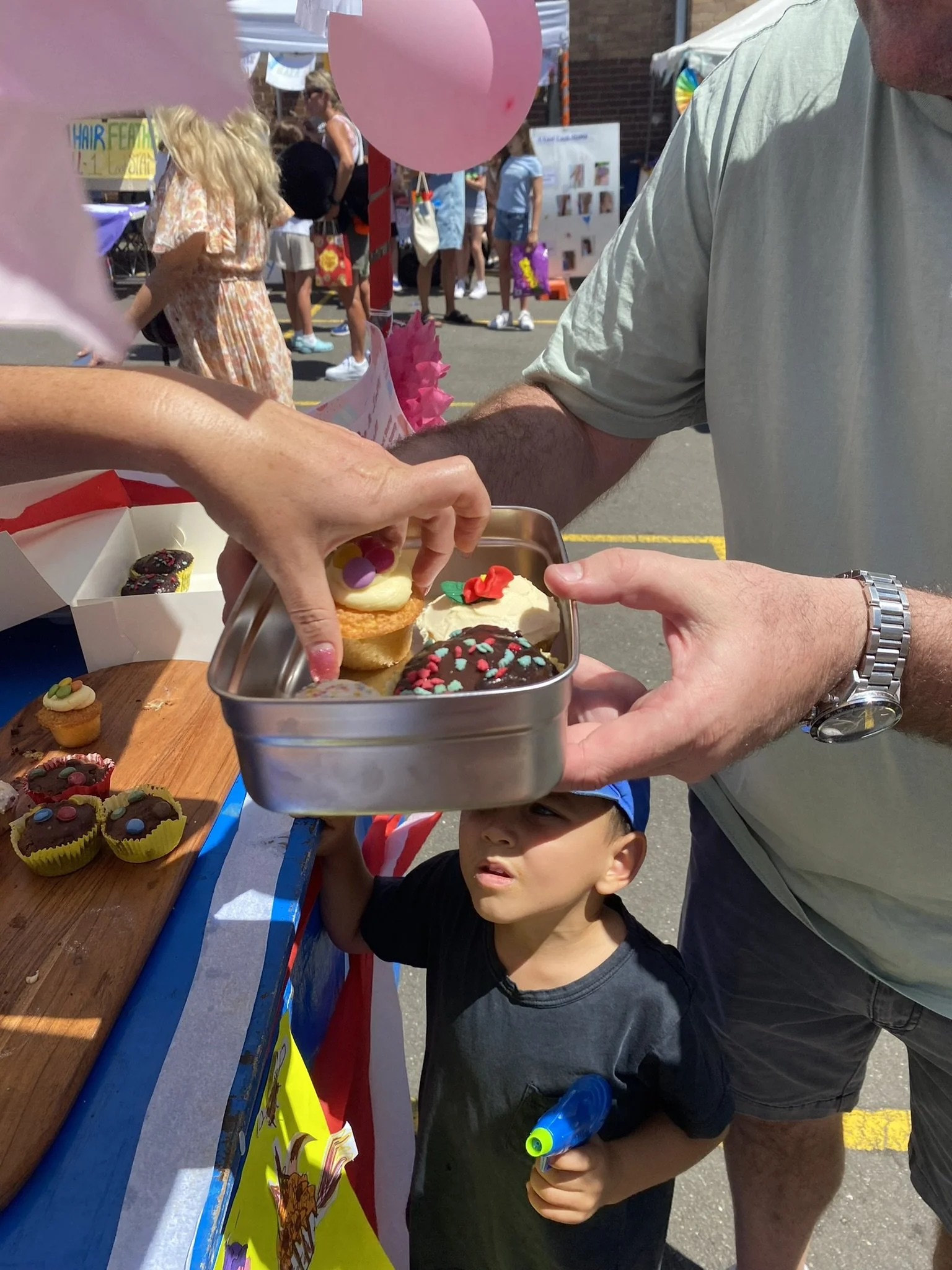Reusable Devolver containers at a school fair
