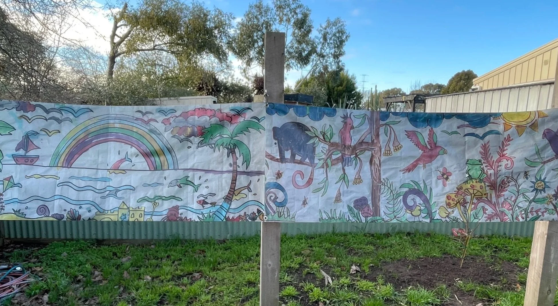 Birre Kindergarten adorned with a creative backdrop to the outdoor stage