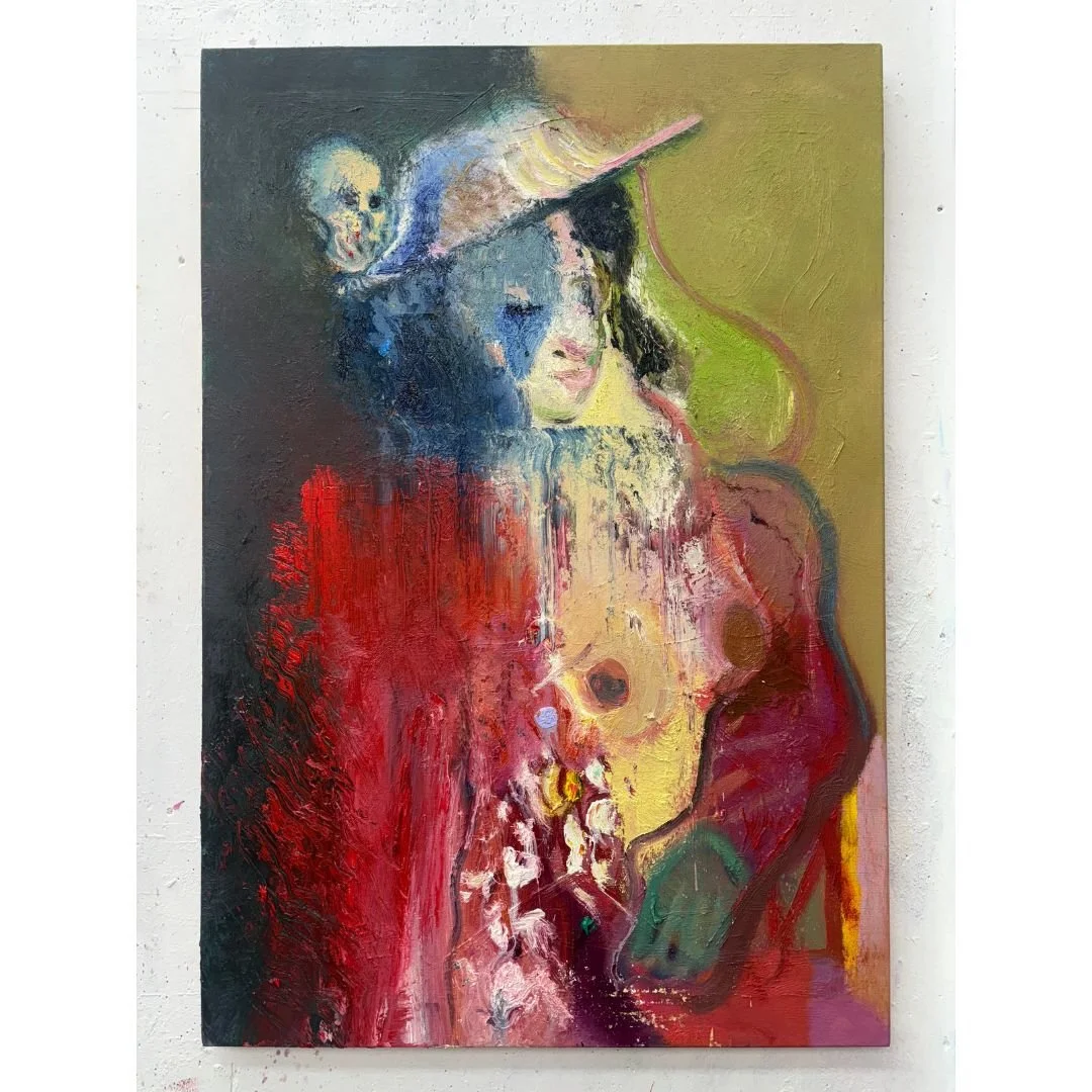 Seated in Red with Skull