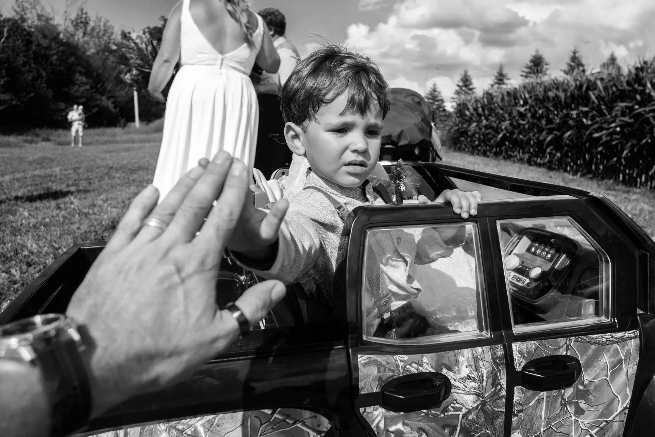 high-five-kid-in-a-toy-car-andreasphoto-1.jpg
