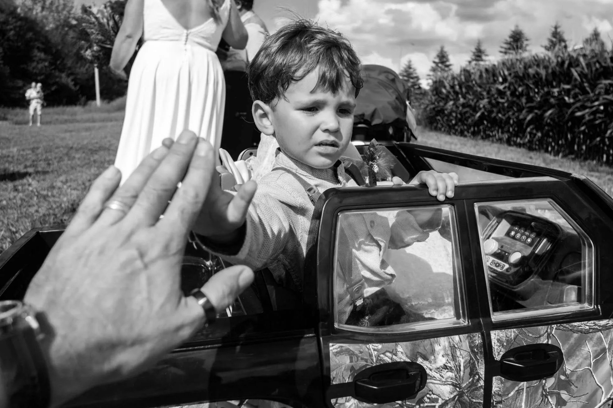 high-five-kid-in-a-toy-car-andreasphoto-1.jpg (Copy) (Copy)