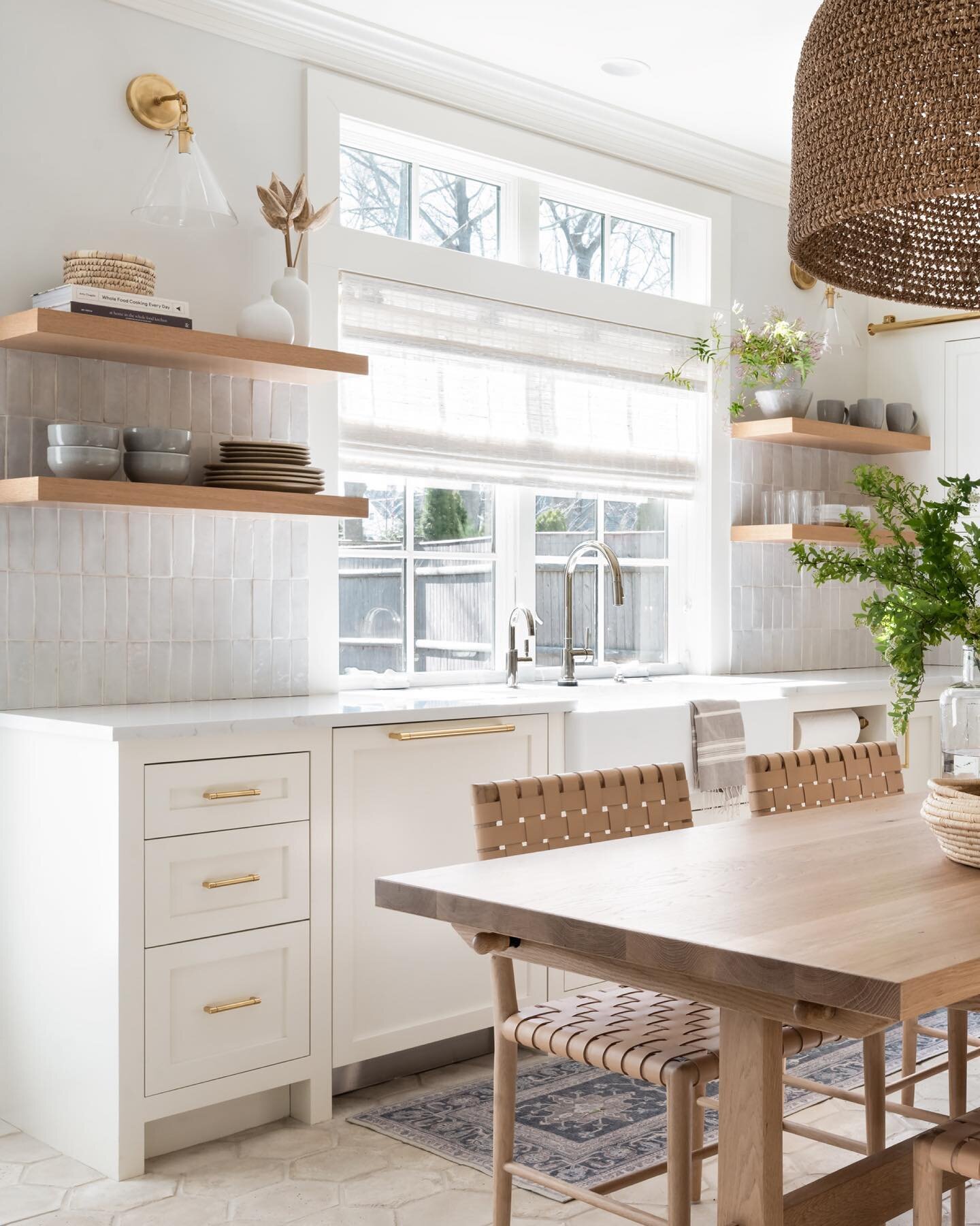 Full side view of this kitchen remodel in Newburyport. Our custom cabinets, shelves and hood were all hand-crafted in our local millwork shop by our talented cabinetmakers. Our standards are different at Premier Builders. Fun fact &mdash; we make all