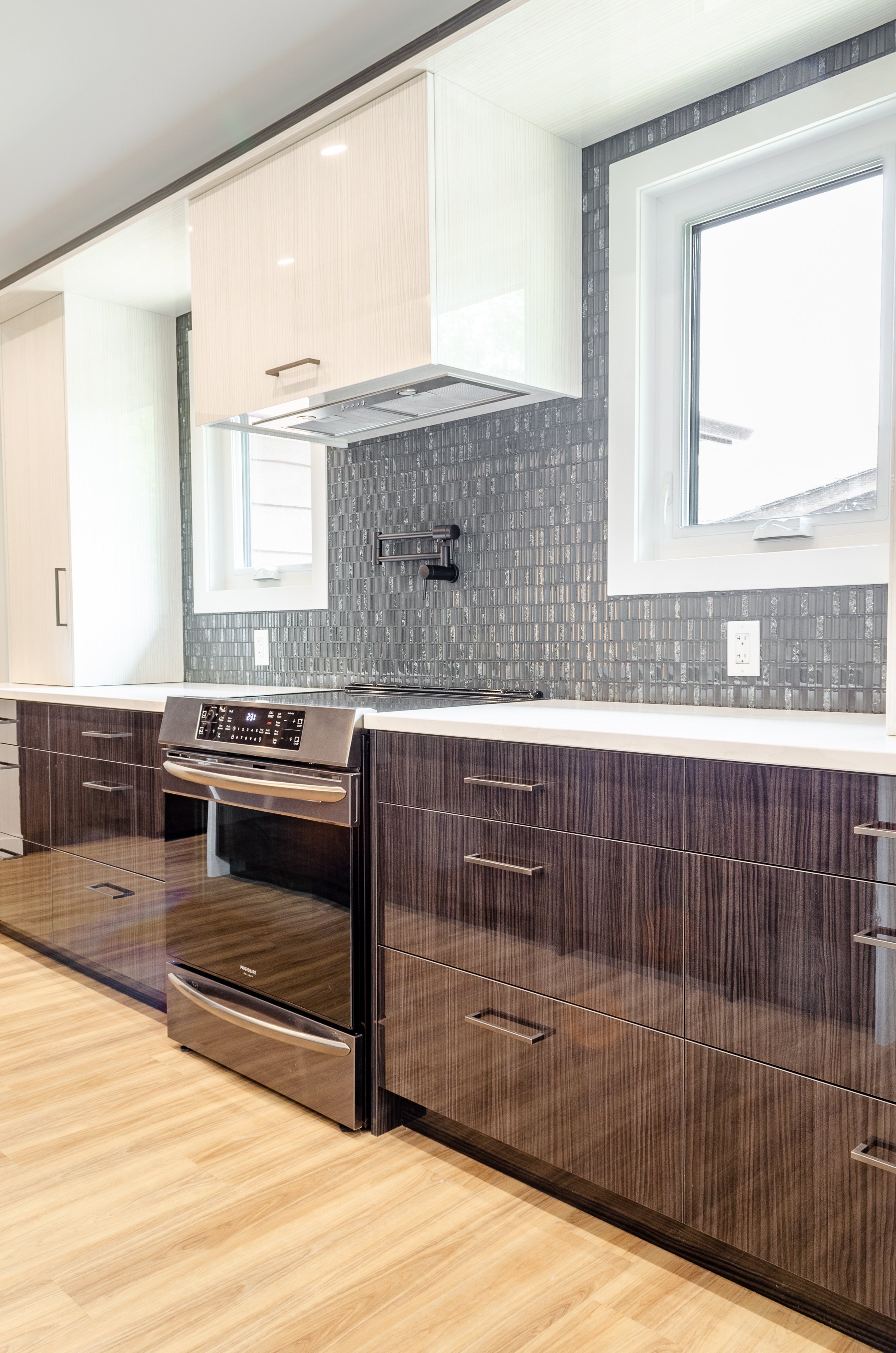 Hidden range hood and pot-filler tap