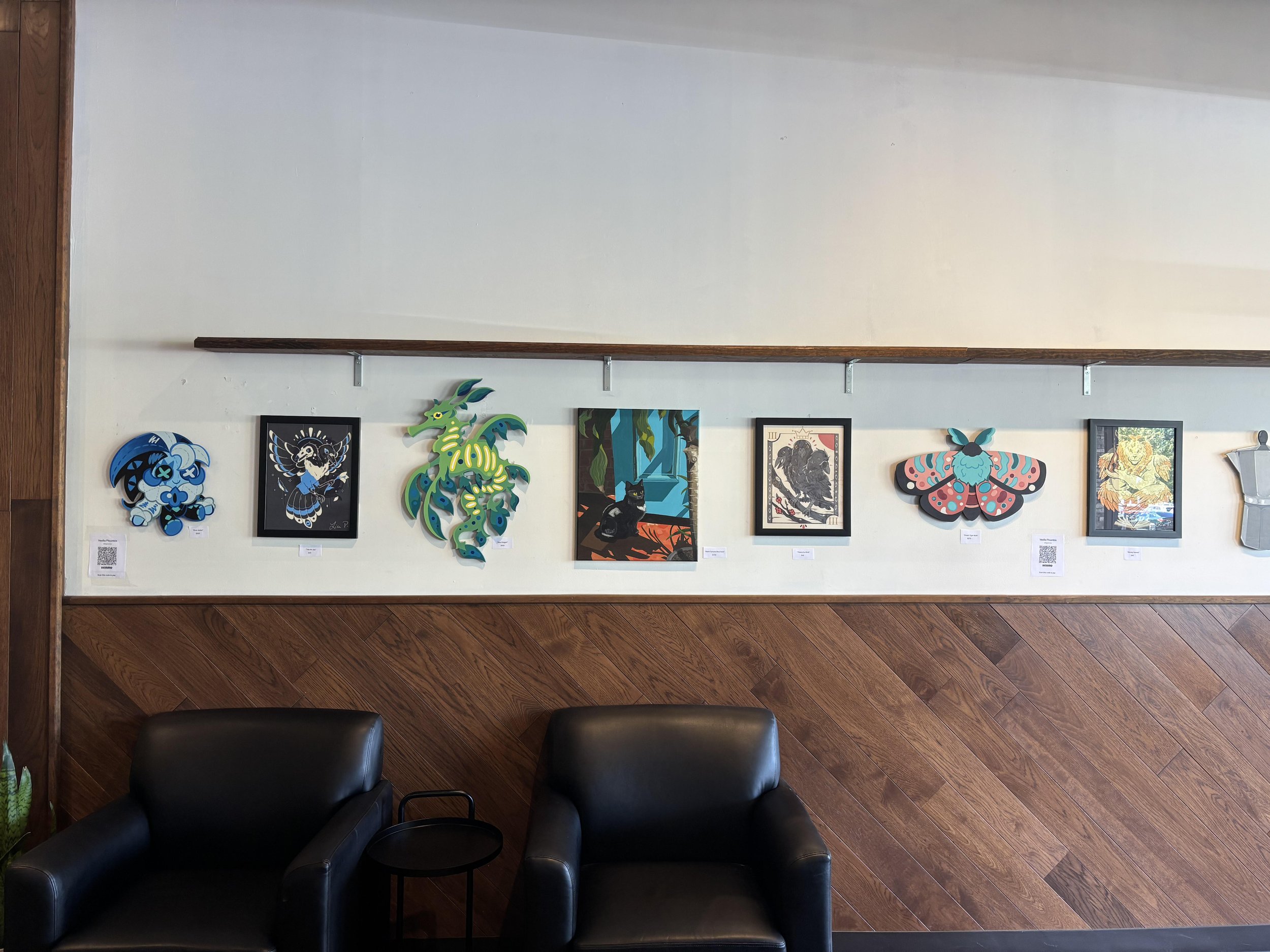Right wall display of the Featured Artist Showcase at Branch Street Cafe in Boardman, Ohio. From September 1st, 2025 to October 31st, 2025