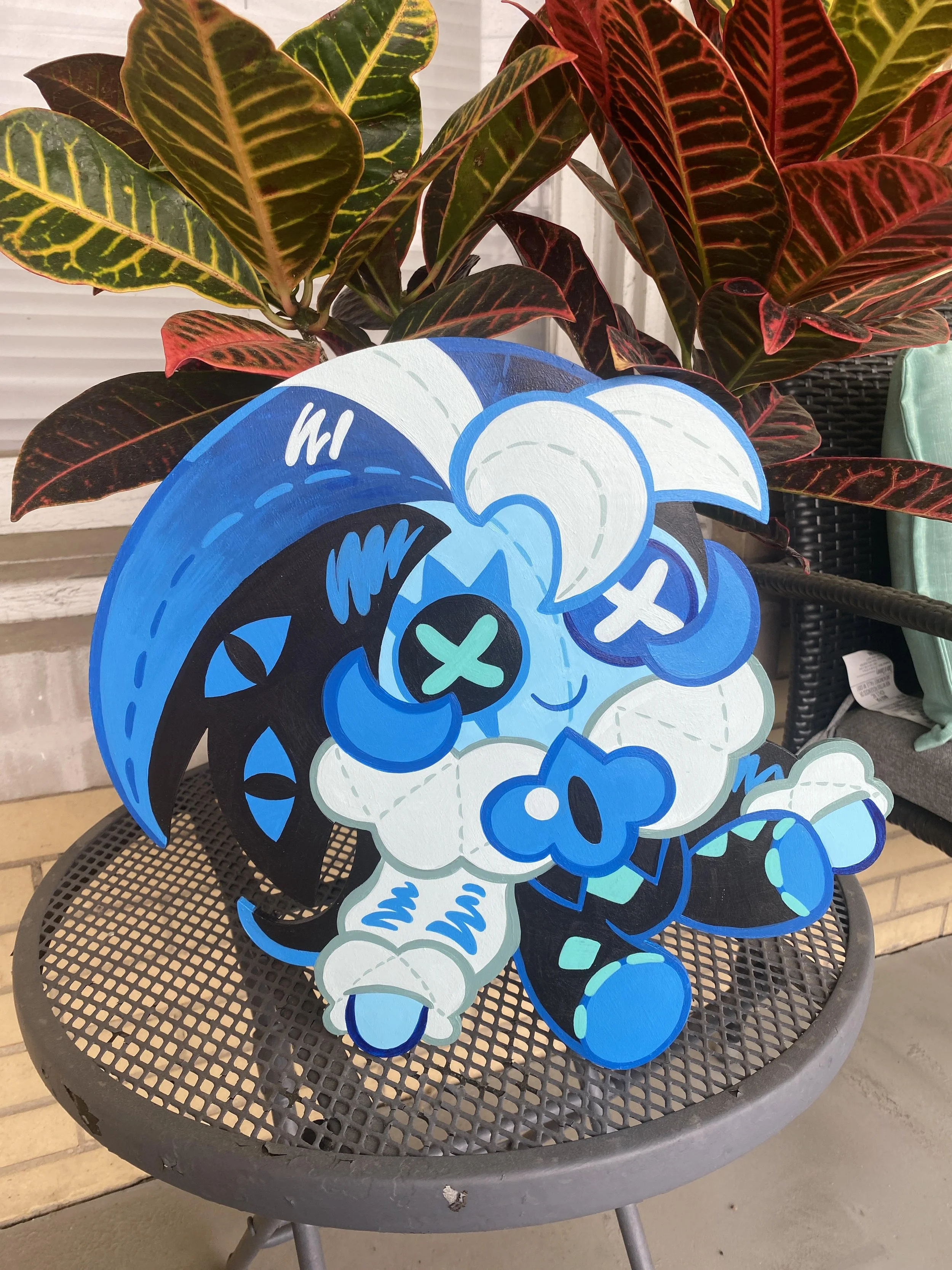 "Jester Plush"- 2025, Acrylic and Latex Paint on Shaped Wood