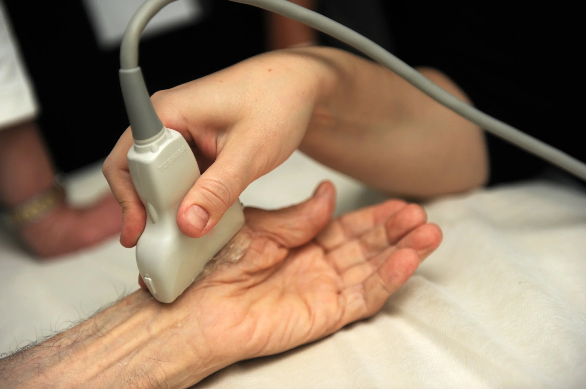 Ultrasound by physical therapist for finger injury diagnosis