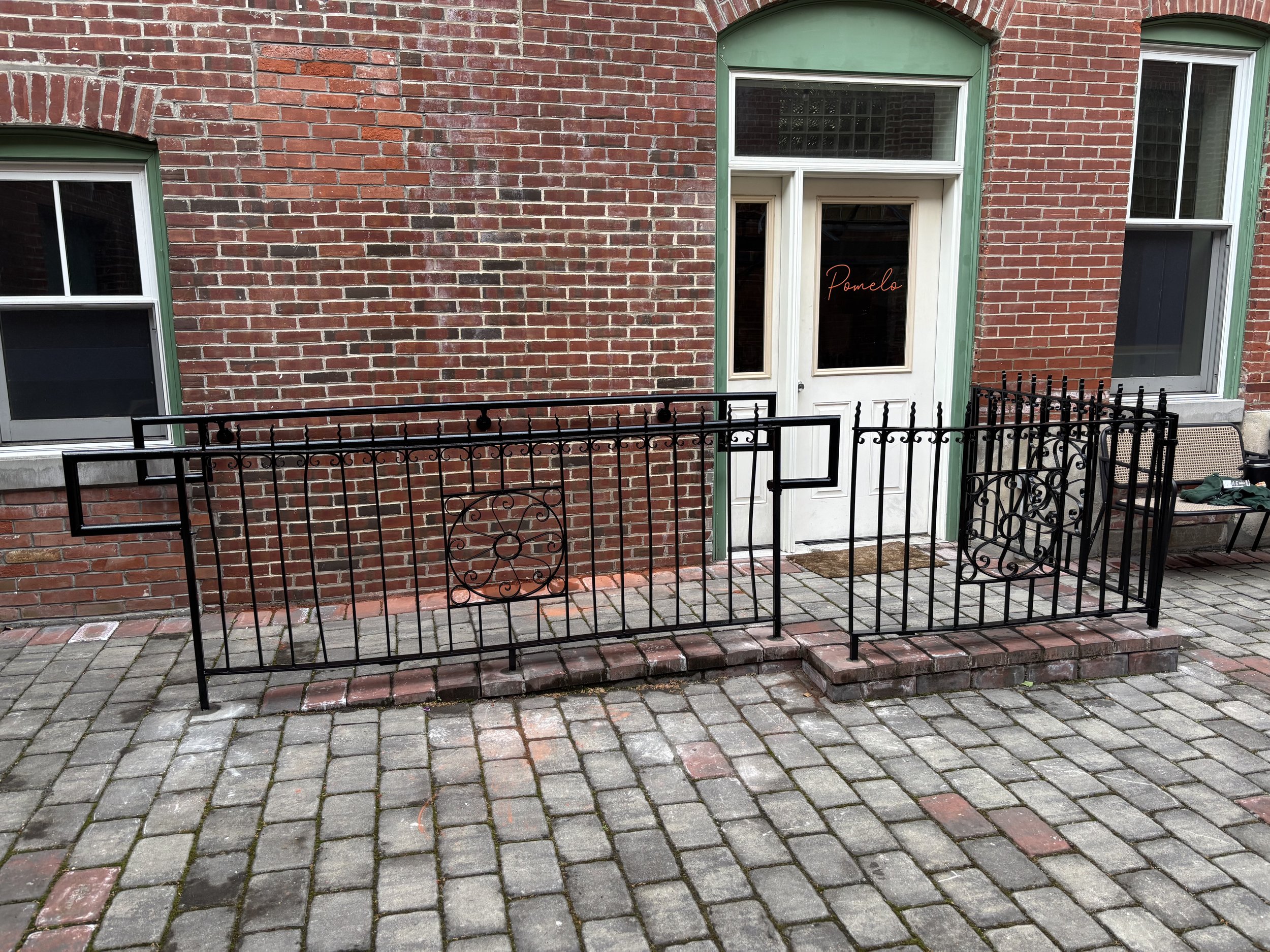 Salvaged Iron Railings with added ADA railings 