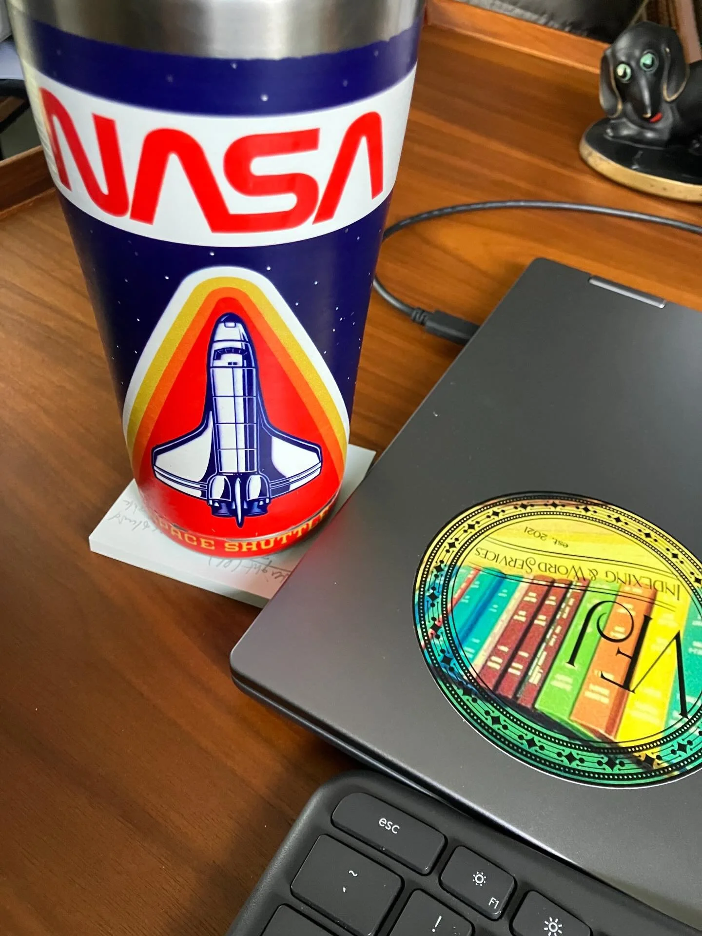 In honor of yesterday&rsquo;s Artemis II rocket launch, here&rsquo;s a photo of what sits on my desk as I work: my water bottle featuring the spacecraft from &ldquo;back in my day.&rdquo; 

Also pictured: my view of the launch. 🚀 

Plus some bonus p