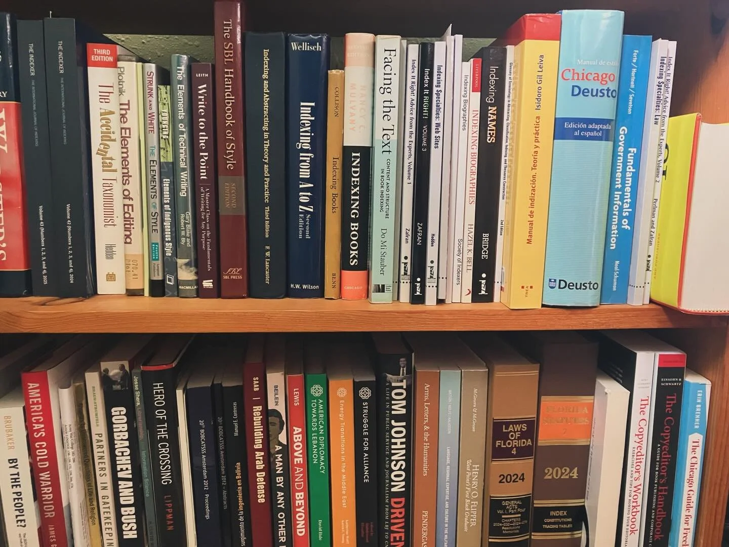 Next to my desk: Reference books &amp; some books I&rsquo;ve indexed. 📚✨

Not pictured: my Pocket Oxford Dictionary and Thesaurus &mdash; because it is currently on my desk, not next to it. 😎📚

#indexingbooks #bookindexing #publishing #referencebo