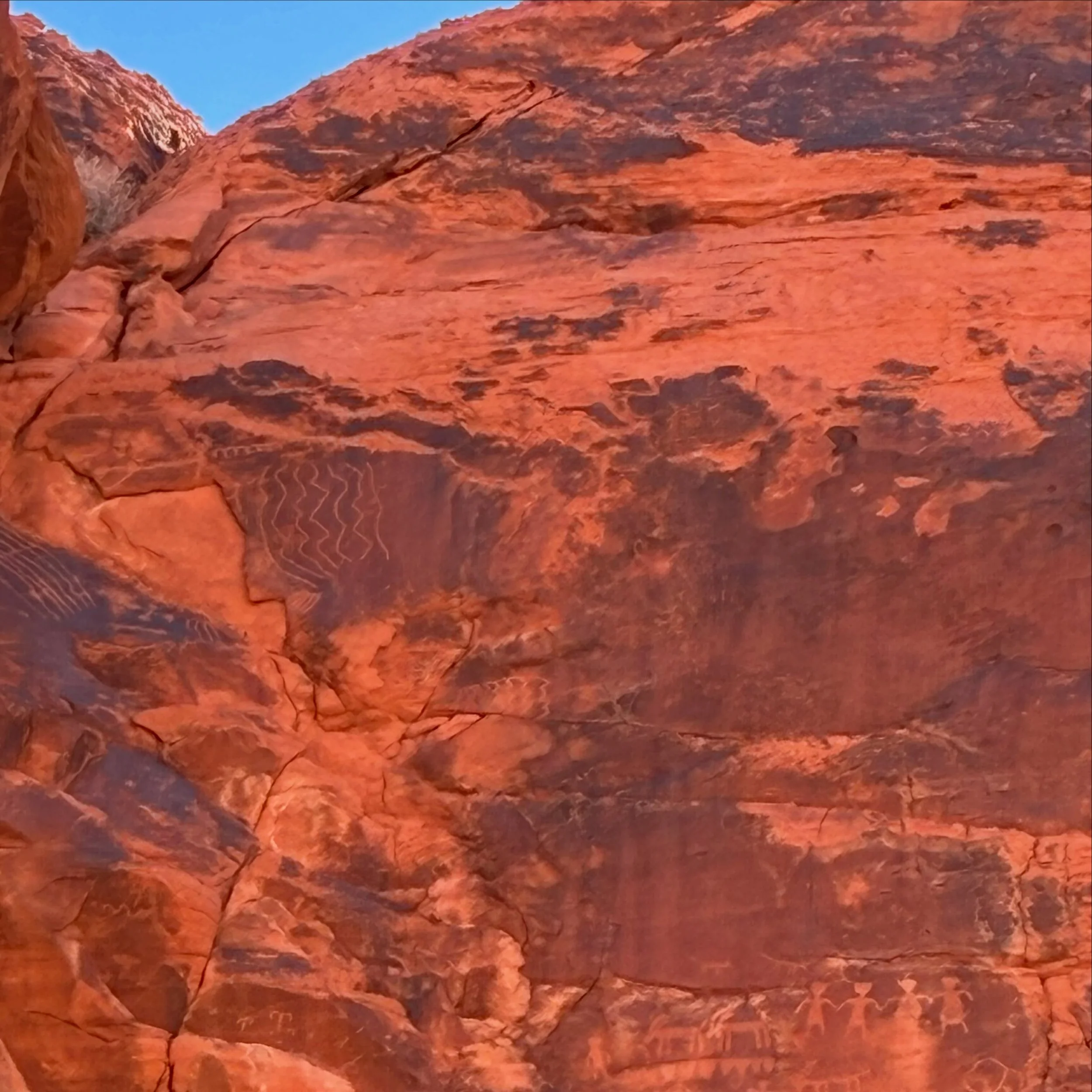 Scenes from the Mojave Desert: Petroglyphs in the Valley of Fire, a raven (or crow?) at the Grand Canyon, the view from Hoover Dam, &amp; a nuclear test site in Nevada.

#history is everywhere ✨