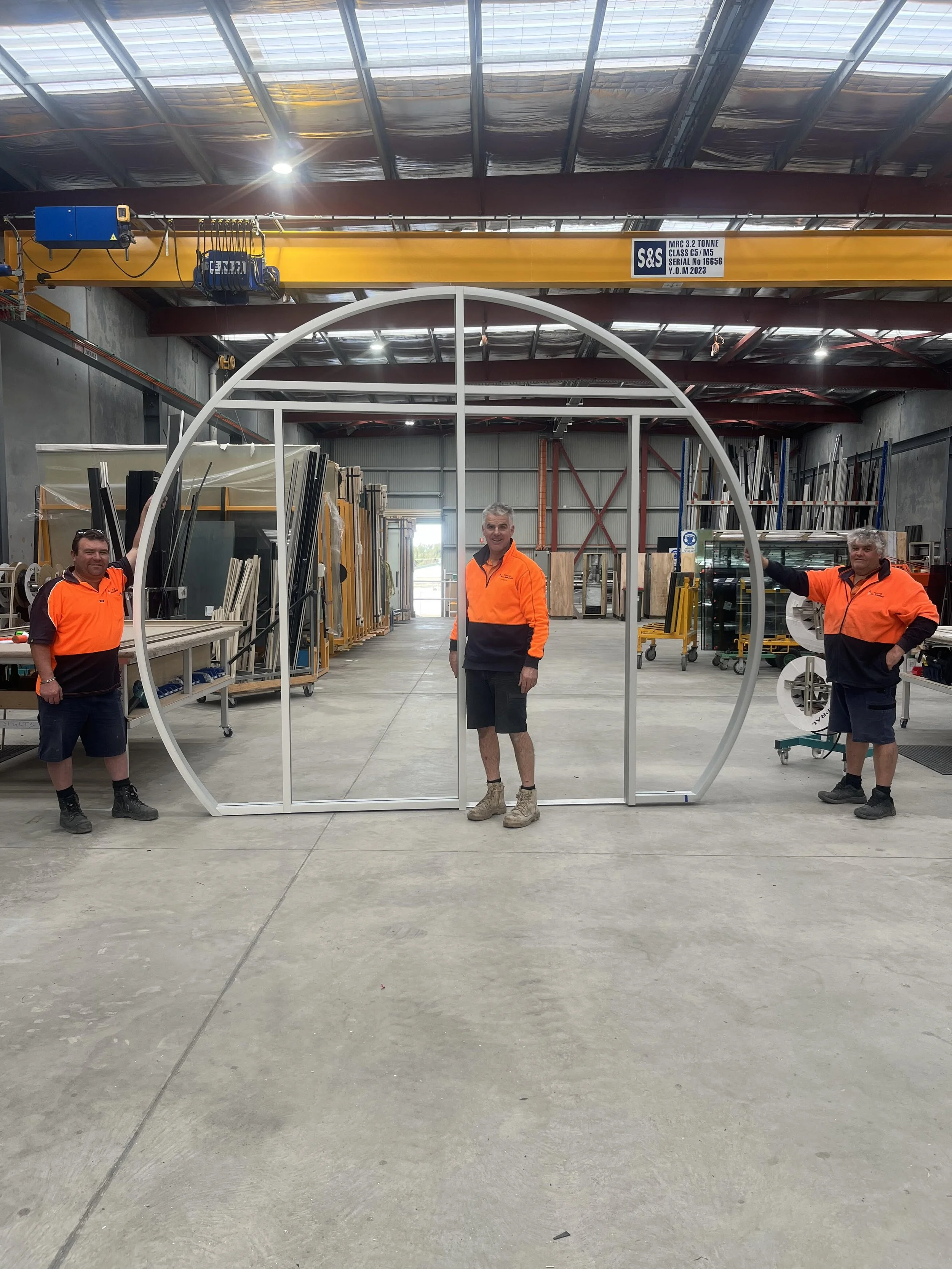 Lee Davis and John with round window frame.jpg