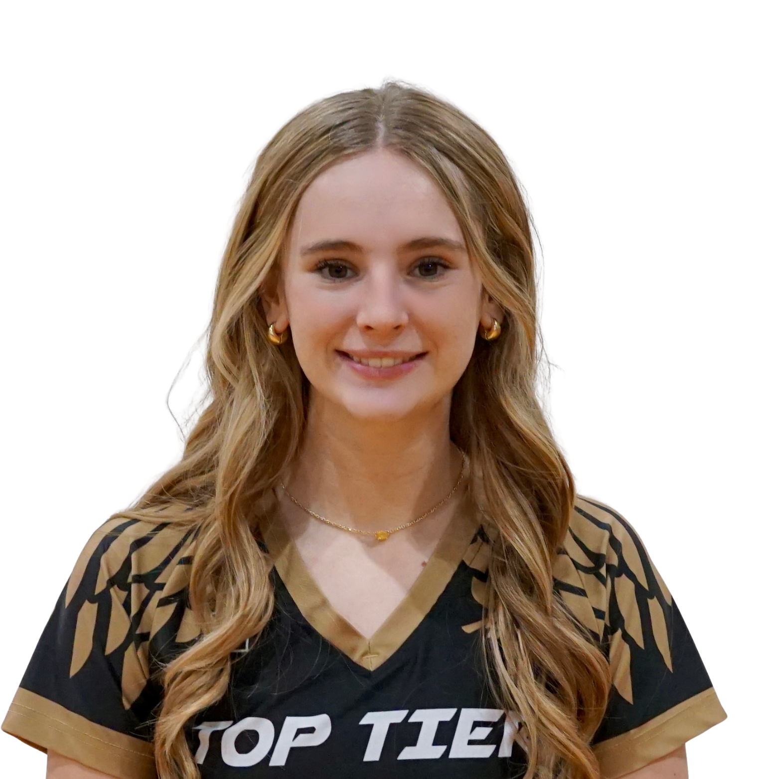 Young woman with long wavy hair, wearing a black and tan sports jersey with 'TOP TIER' on it, and gold jewelry, smiling at the camera.