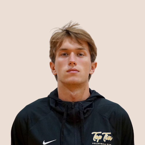Young man with light brown hair wearing a black zip-up hoodie with "Top Tier Volleyball Club" logo and Nike swoosh logo.